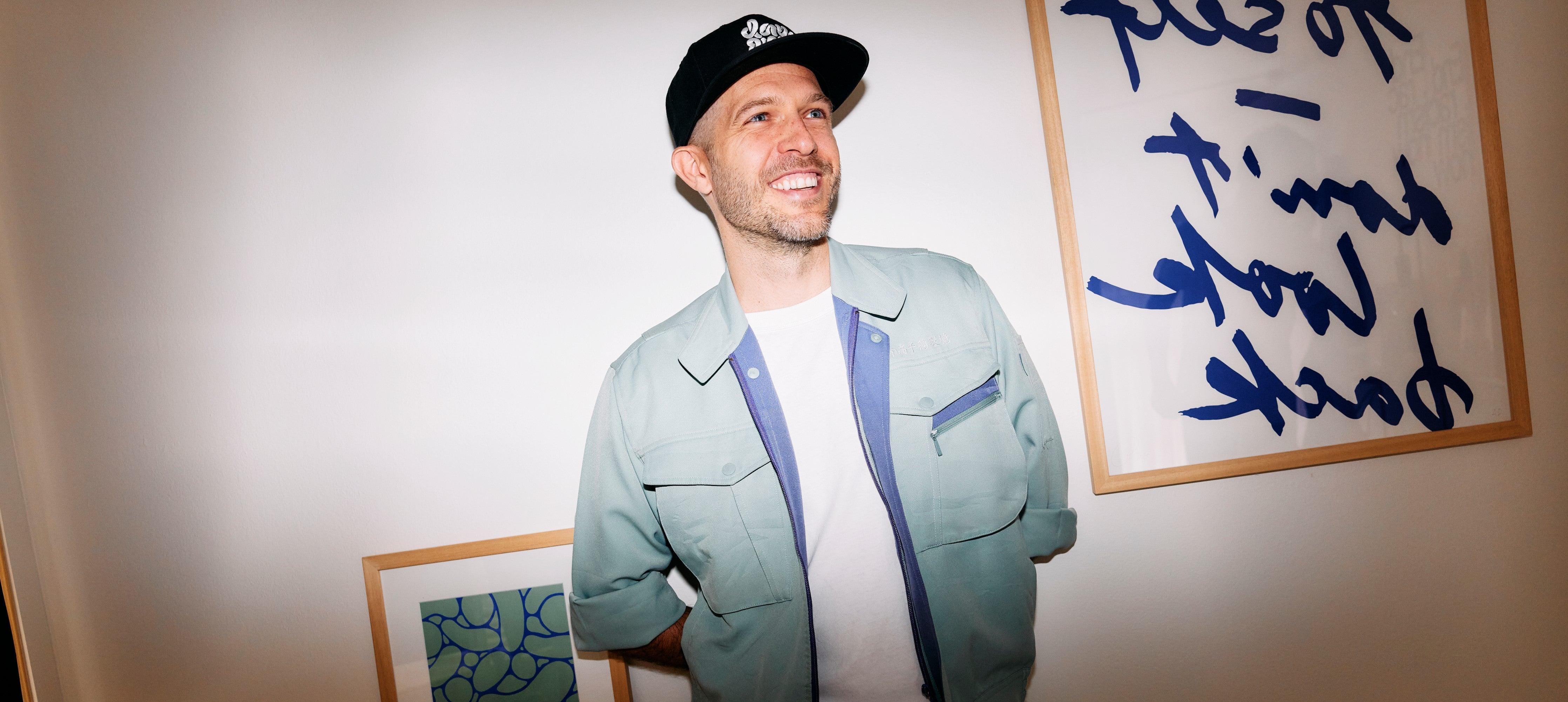 Pieter Boels standing and laughing